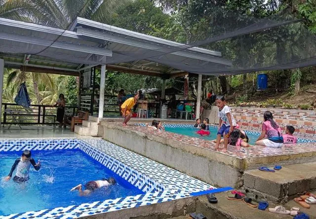 Angels Farm and Pool Resort Iligan Enjoying Pool Amenities